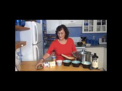 Woman preparing ingredients in kitchen, cooking setup.