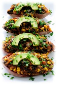 Stuffed sweet potatoes with avocado and herbs